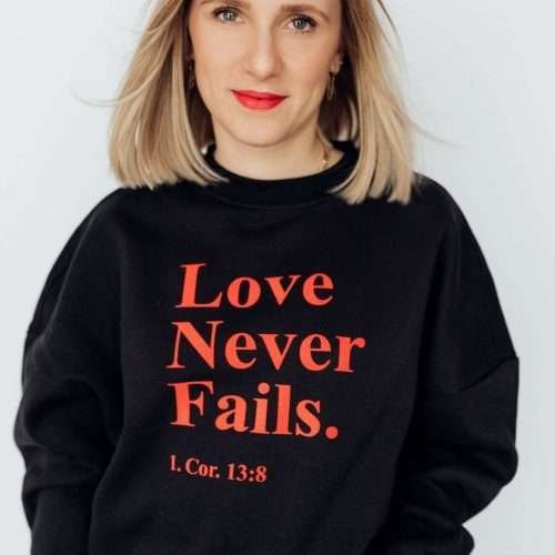 christliches Produkt Love never fails - Oversize Sweater